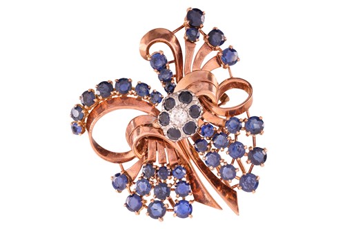 Lot 123 - Garrard - a sapphire and diamond duette brooch,...