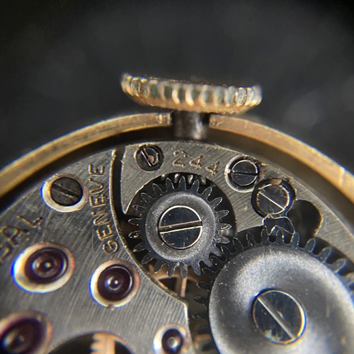 Lot 219 - A sapphire and diamond concealed watch bangle,...