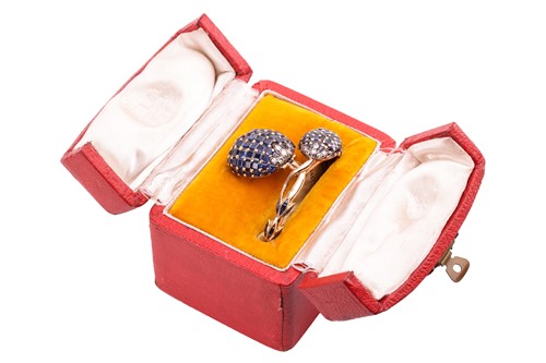 Lot 219 - A sapphire and diamond concealed watch bangle,...