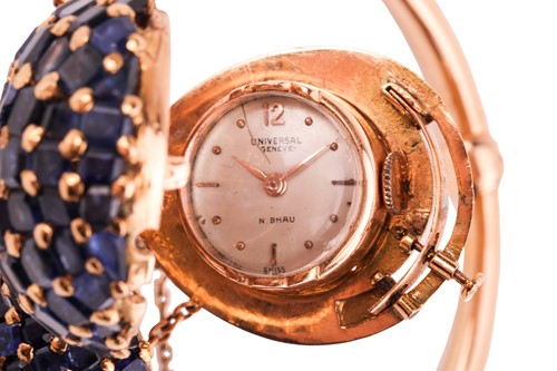 Lot 219 - A sapphire and diamond concealed watch bangle,...