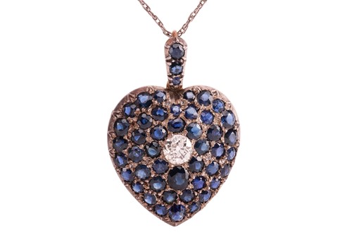 Lot 100 - A sapphire and diamond heart-shaped locket on...