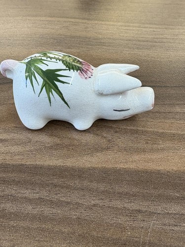 Lot 170 - Three small Wemyss Ware pigs, in black and...