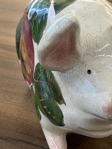 Lot 170 - Three small Wemyss Ware pigs, in black and...