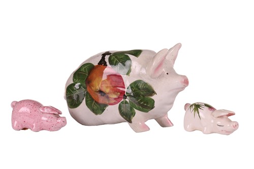Lot 170 - Three small Wemyss Ware pigs, in black and...