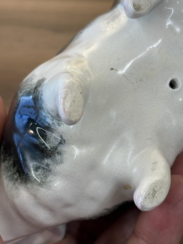 Lot 170 - Three small Wemyss Ware pigs, in black and...