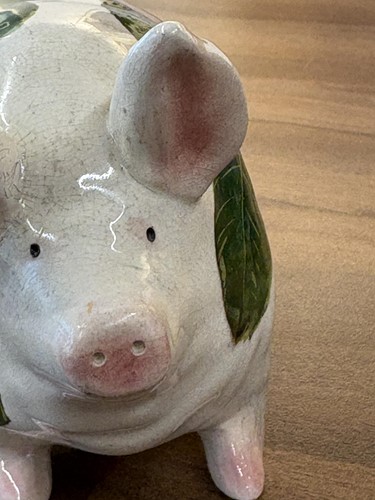 Lot 170 - Three small Wemyss Ware pigs, in black and...