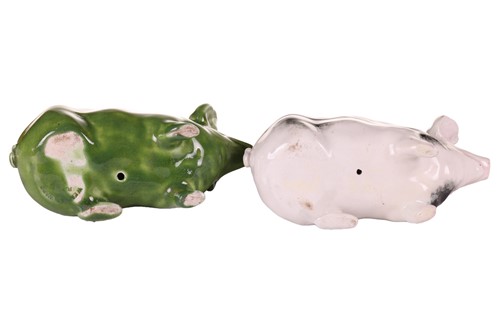 Lot 170 - Three small Wemyss Ware pigs, in black and...