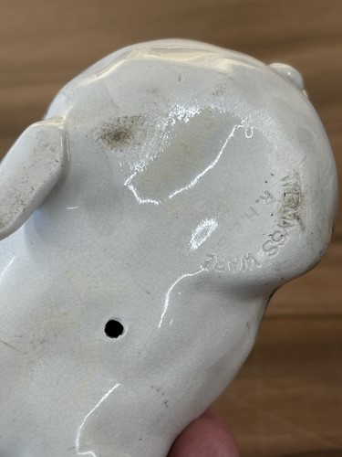 Lot 170 - Three small Wemyss Ware pigs, in black and...