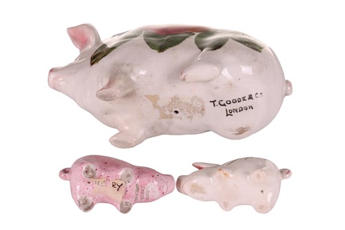 Lot 170 - Three small Wemyss Ware pigs, in black and...