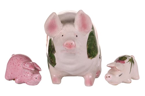 Lot 170 - Three small Wemyss Ware pigs, in black and...