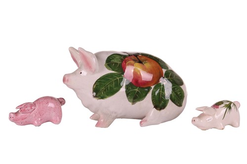 Lot 170 - Three small Wemyss Ware pigs, in black and...
