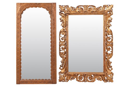Lot 135 - A Florentine-style carved and gilt wall mirror,...