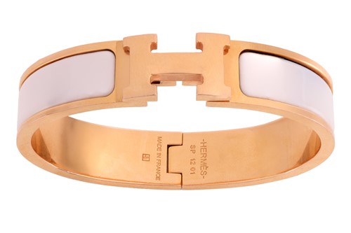 Lot 54 - Hermes - a Clic H bracelet, of oval form with...