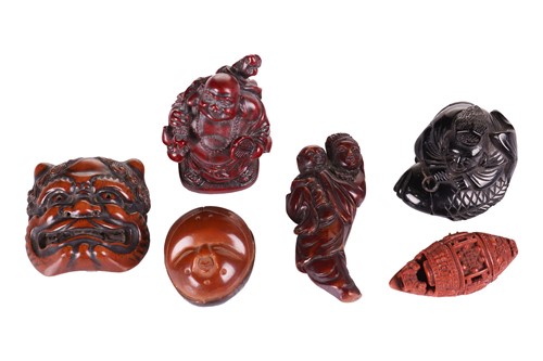 Lot 74 - A Japanese carved boxwood netsuke in the form...