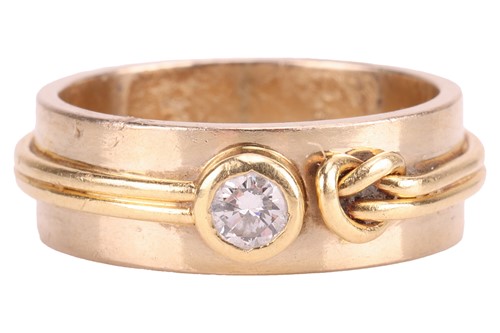 Lot 136 - A diamond-set band, featuring applied wirework...
