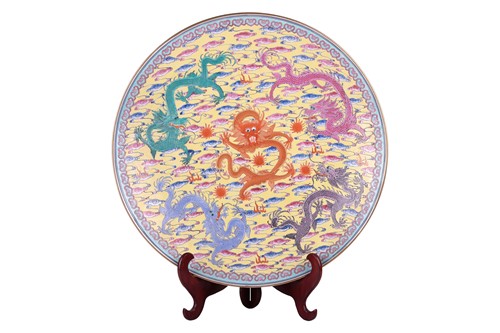 Lot 33 - A large Chinese yellow ground Famille Rose...