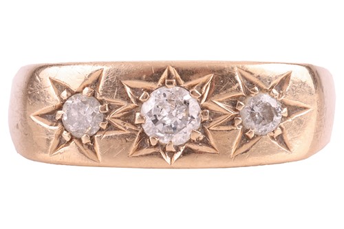 Lot 150 - A diamond-set gypsy ring, star-set with three...