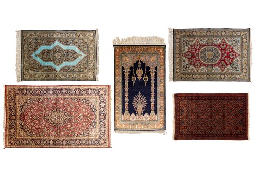 Lot 146 - A group of silk-on-silk rugs including a...
