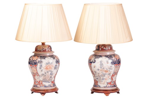 Lot 129 - A pair of large Imari porcelain baluster table...
