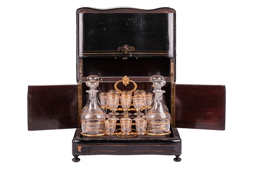 Lot 214 - A Victorian ebonised serpentine-fronted...