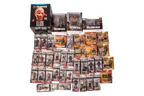 Lot 69 - A large collection of Walking Dead collectible...