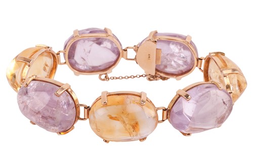 Lot 20 - An amethyst and citrine-set bracelet, set with...