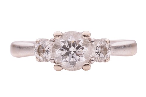 Lot 15 - A diamond trilogy ring; the central stone a...