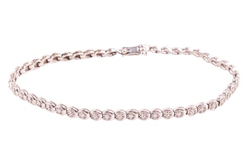 Lot 152 - A 9ct white gold diamond-set tennis bracelet;...