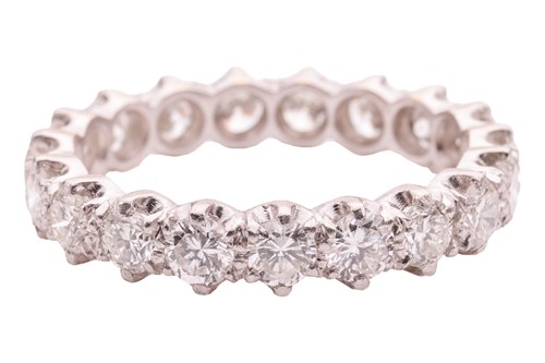 Lot 157 - A diamond eternity ring, with an estimated...