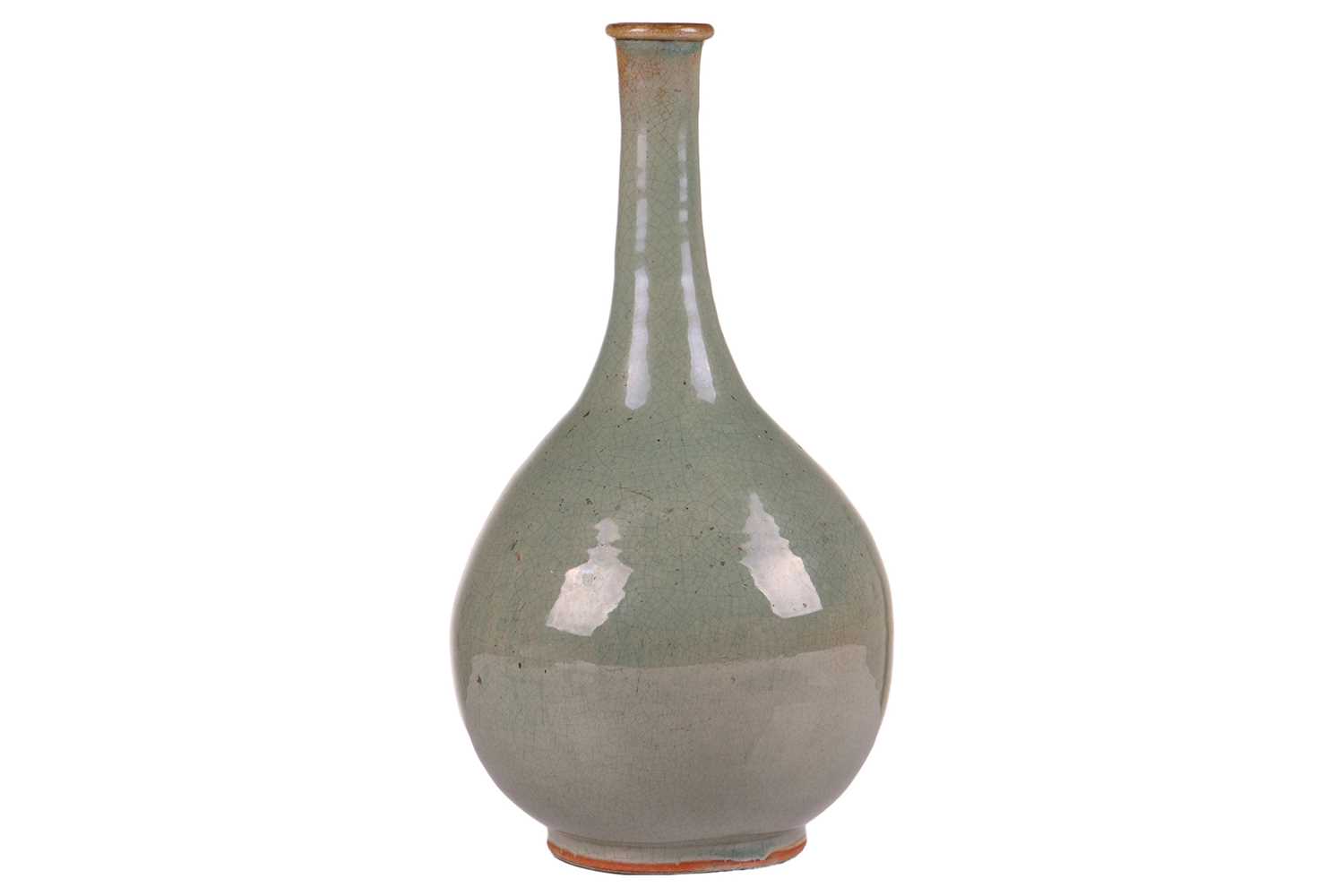 Lot 63 - A Chinese Longquan celadon bottle vase, early...