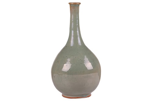 Lot 63 - A Chinese Longquan celadon bottle vase, early...
