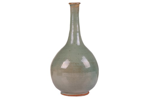 Lot 63 - A Chinese Longquan celadon bottle vase, early...