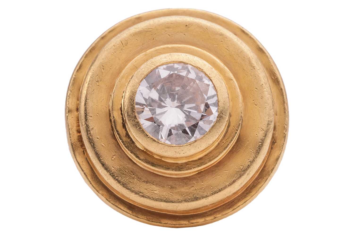 Lot 236 - A modernist diamond ring, featuring a central...