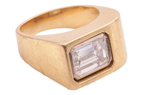 Lot 234 - A Modernist diamond-set ring; the emerald-cut...