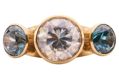 Lot 208 - A gem-set dress ring, comprising a central...