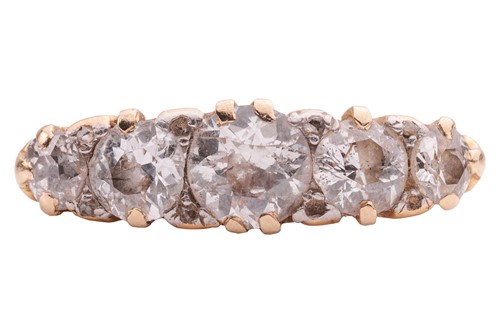 Lot 211 - A diamond-set half-hoop ring, claw-set with...