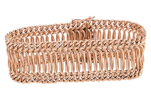 Lot 171 - A link bracelet in 9ct gold, comprising a...