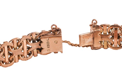 Lot 78 - A fancy bismarck link bracelet in 9ct gold,...