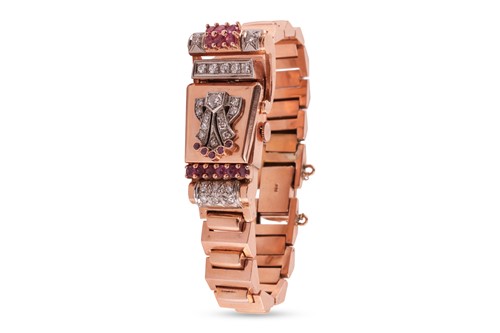 Lot 249 - A diamond and ruby-set concealed cocktail...