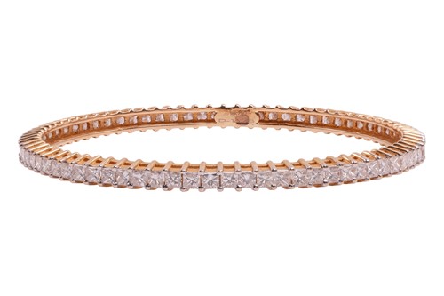 Lot 200 - A diamond close bangle, with an estimated...