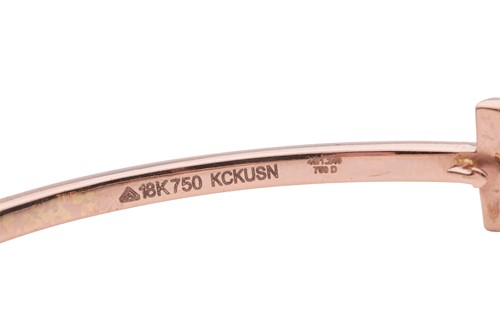 Lot 56 - A diamond-set hinged bangle, in the style of...