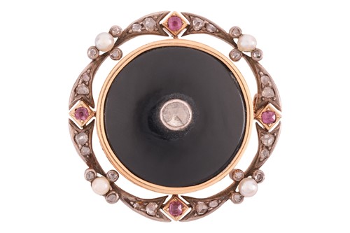 Lot 42 - A gem-set brooch, the onyx circular plaque...