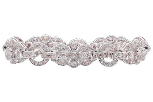 Lot 228 - A Late Art Deco diamond-set link bracelet,...