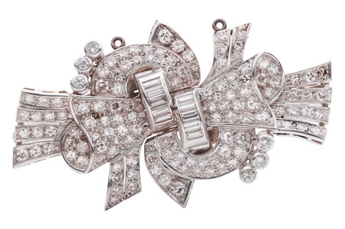 Lot 215 - A diamond-set duette brooch, comprising two...