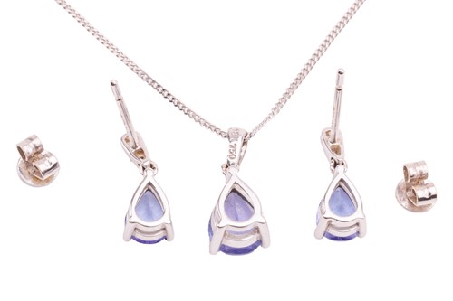 Lot 16 - A tanzanite-set pendant and earrings suite,...