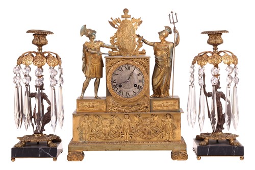 Lot 120 - A French Empire gilt metal figural mantel...