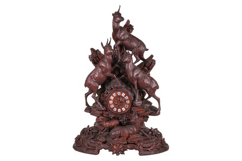 Lot 126 - A large and impressive Black Forest carved...