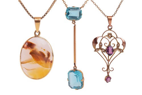 Lot 189 - A group of three gem-set pendants; to include...