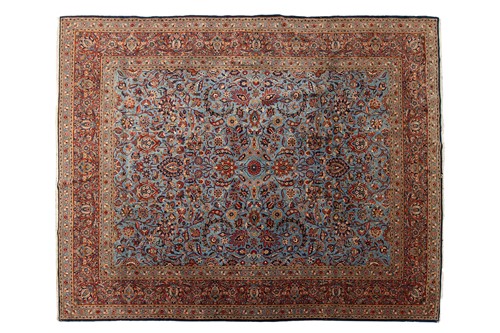 Lot 106 - A blue ground Isfahan carpet with Caspian blue...