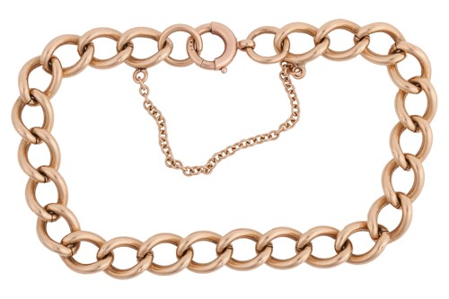 Lot 196 - A 9ct gold bracelet, the curb links leading to...